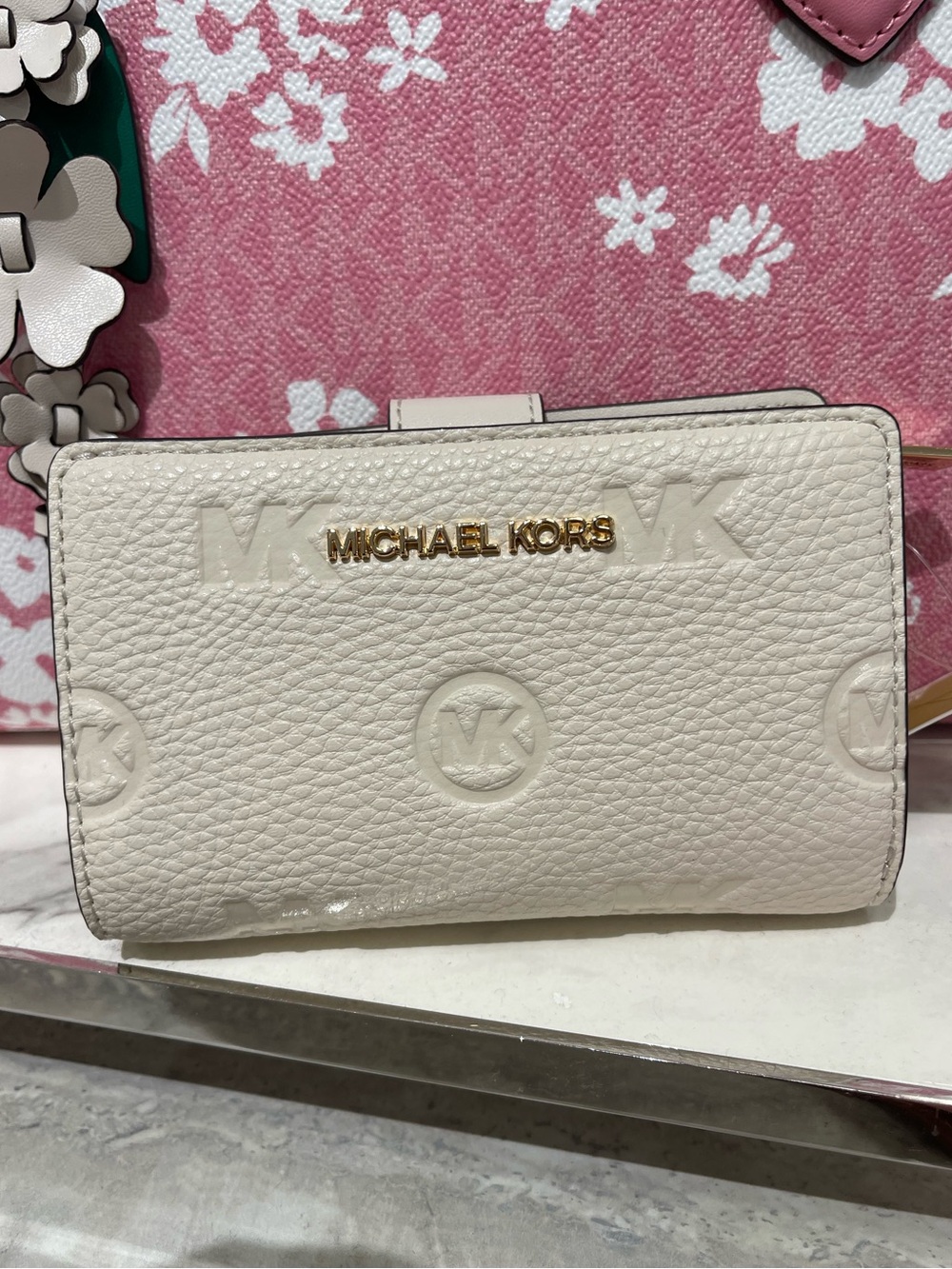 Michael Kors Jet Set Travel Med MK Logo Debossed Bifold Wallet
Light Cream
NWT